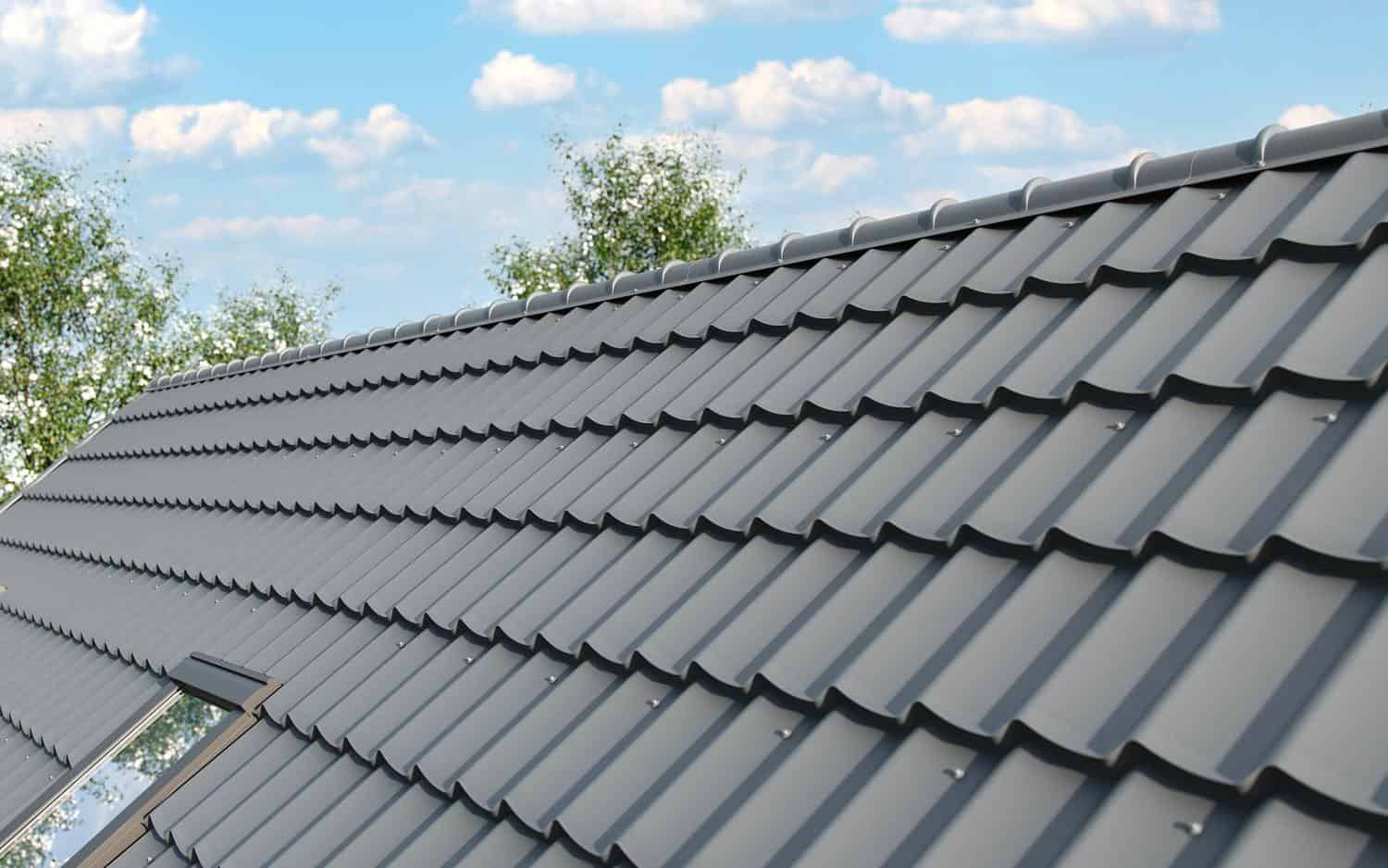 Close-up of a new gray metal roof with shingles in Lone Tree, CO.