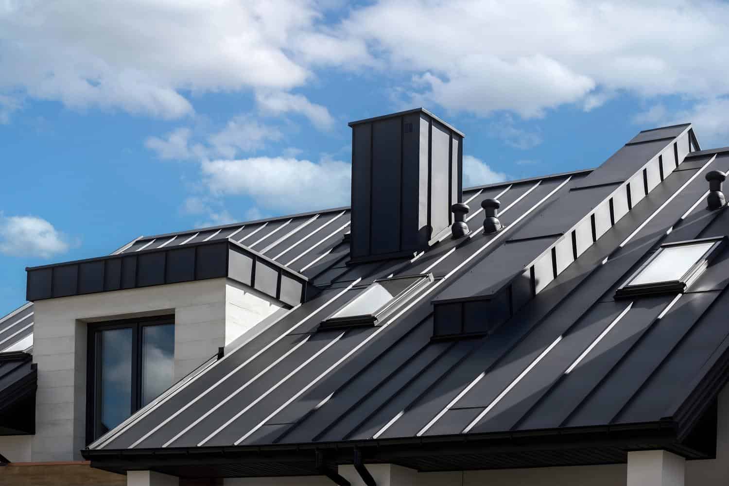 Contemporary metal roofing with skylights and chimney in Fountain, CO.