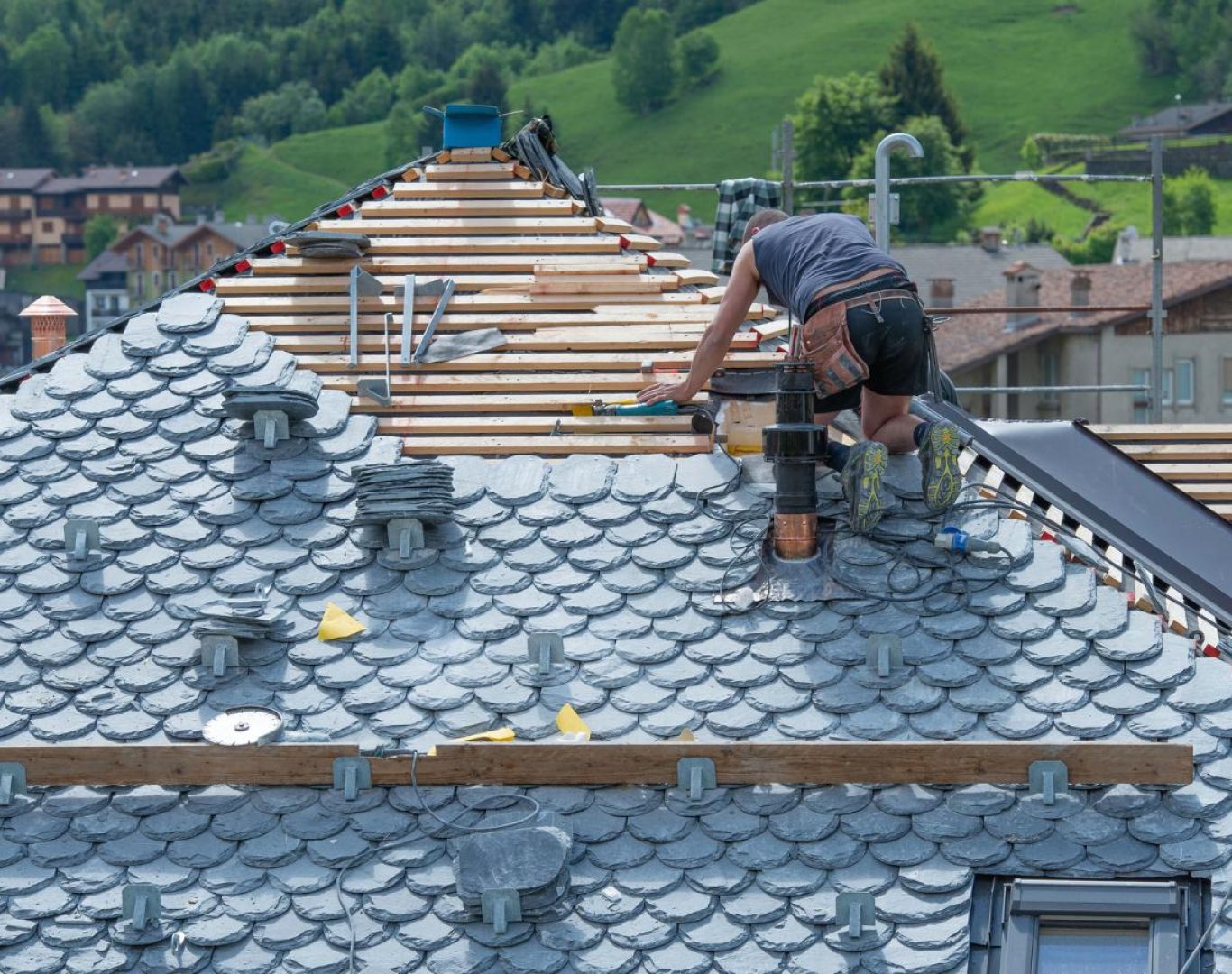 Roofing company in Denver, CO replacing roof on a historic residential home